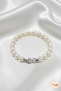 Elegant White Pearl Bracelet with Silver Infinity Clasp