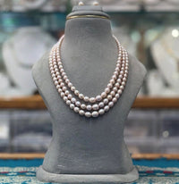 Beautiful  triple layered strand pearl necklace