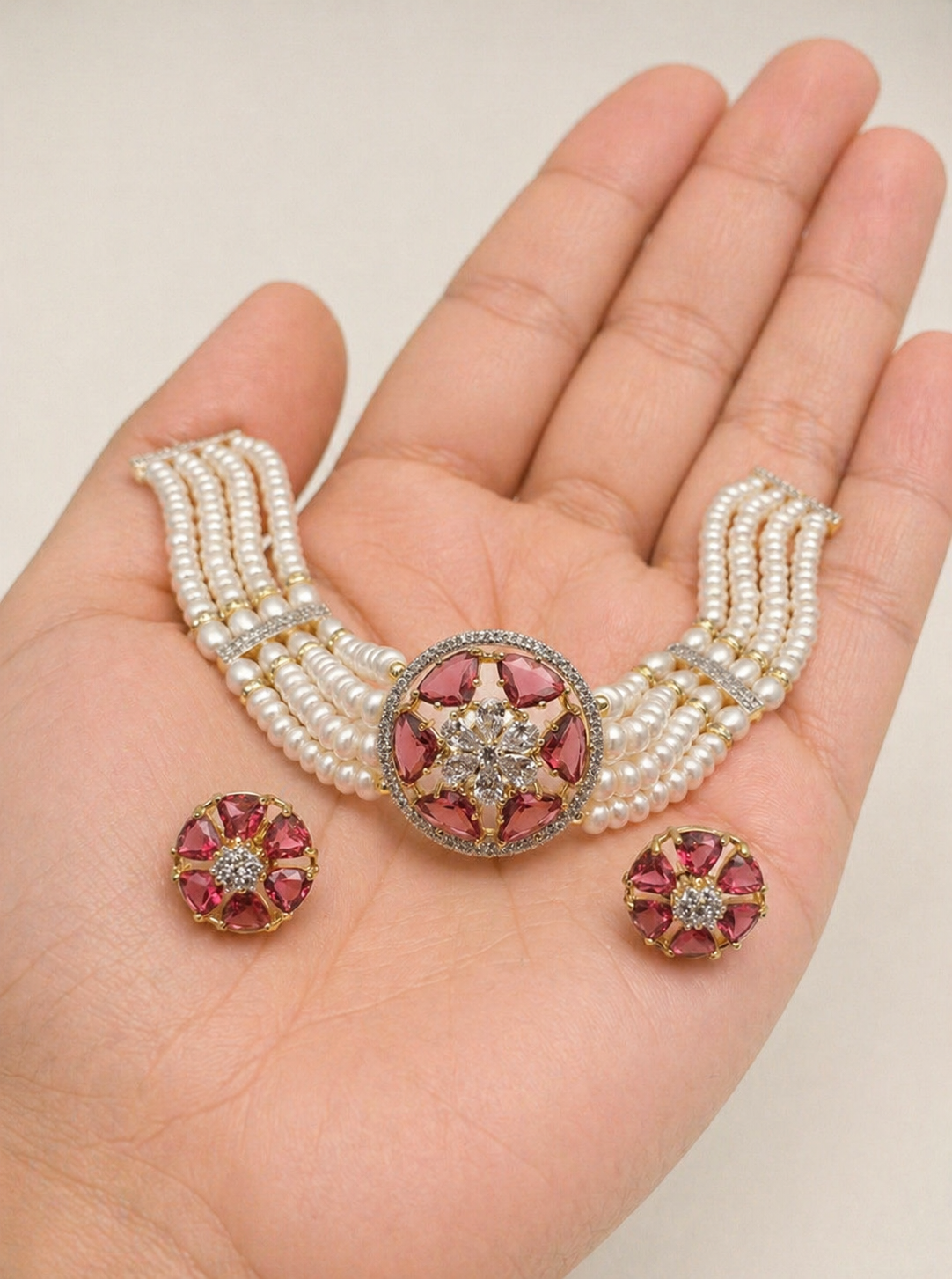 Elegant Multi-Strand Pearl Choker Set with Ruby Floral Centerpiece